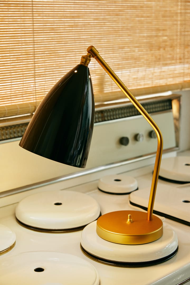 Lampe de table Gräshoppa brillante, Noir-laiton GUBI