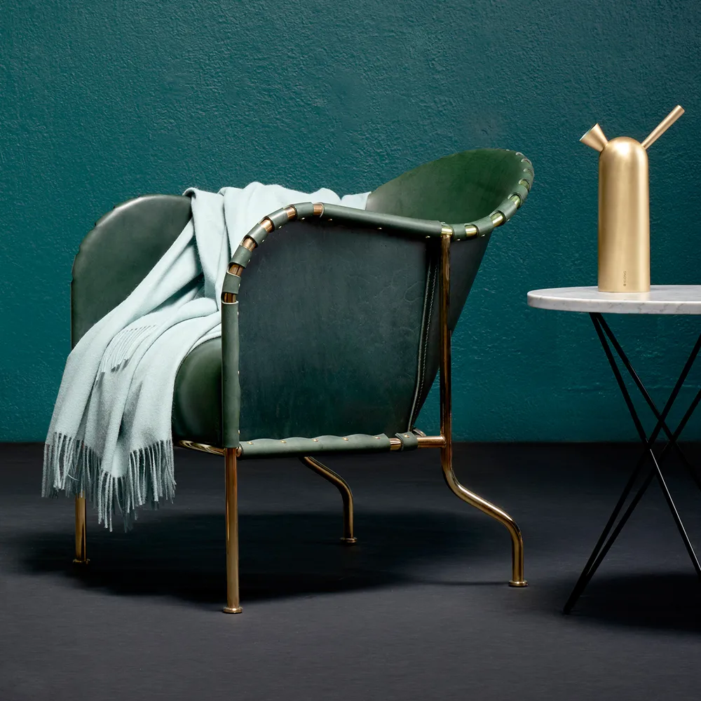 Fauteuil Bruno, Cuir pleine fleur vert bouteille-piètement laiton Källemo