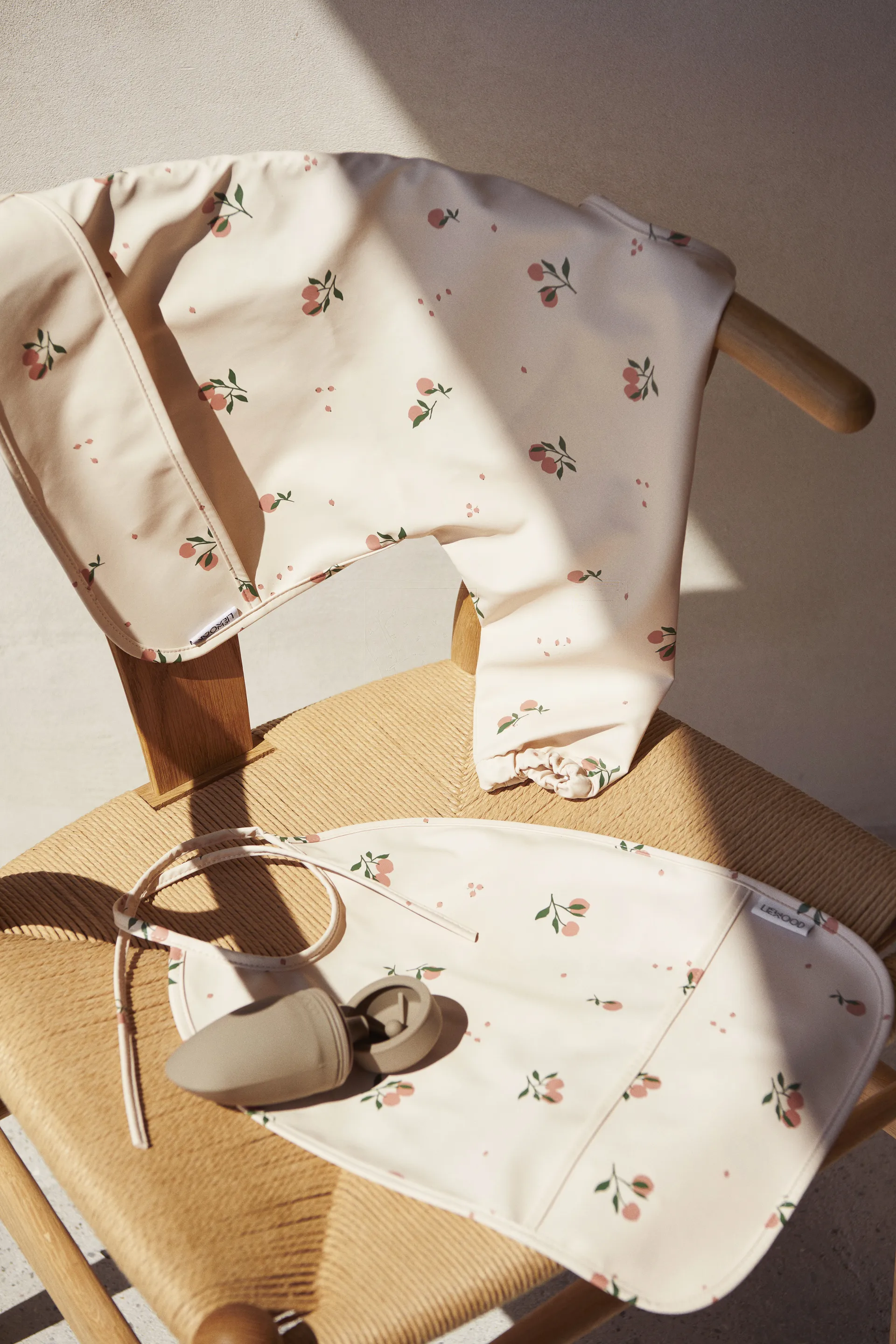 Bavoir à manches Merle, Peach-Sea shell mix Liewood