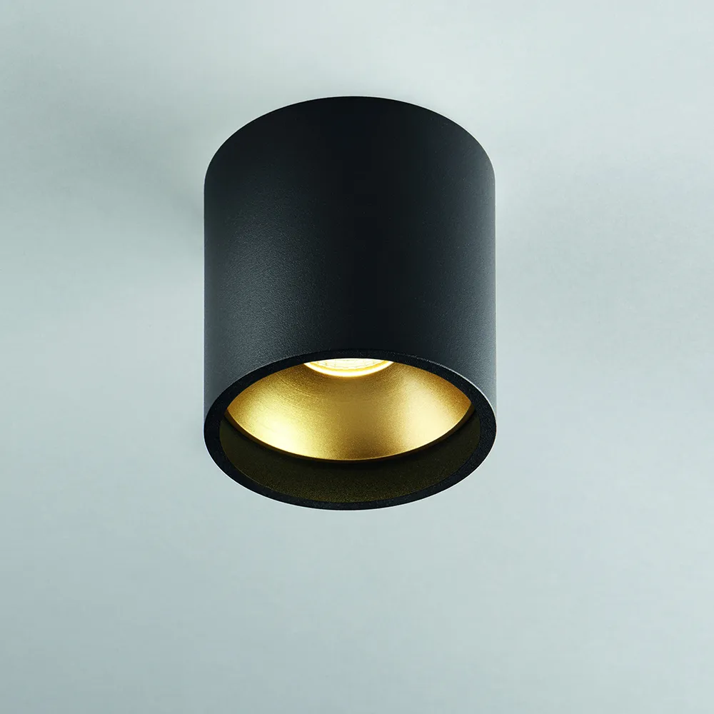 Solo Round spotlight, black/gold, 3000 kelvins Light-Point