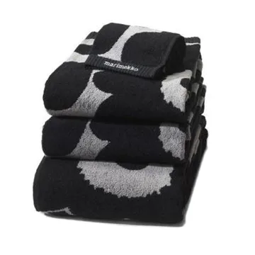 Serviette Unikko noir-sable - Serviette - Marimekko