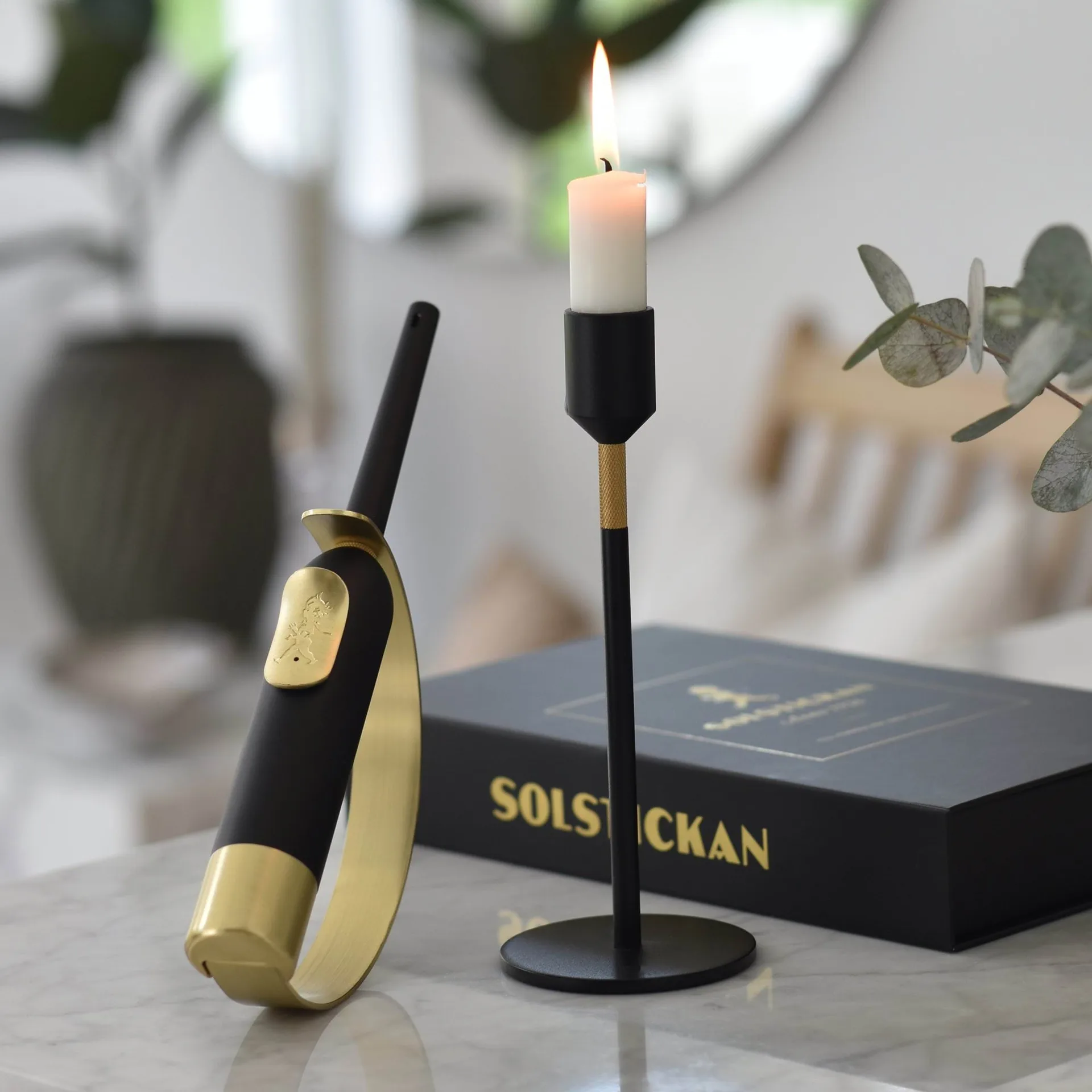 Solstickan briquet coupe-flamme, Noir-laiton Solstickan Design
