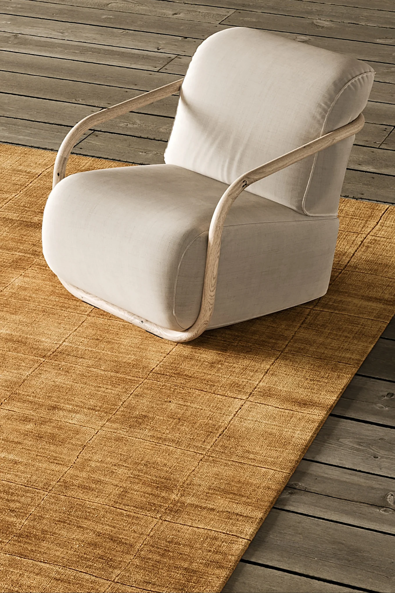 La photo montre le fauteuil Hunk de Hem dans une teinte brun foncé qui reflète les tendances couleurs pour les intérieurs en 2026.