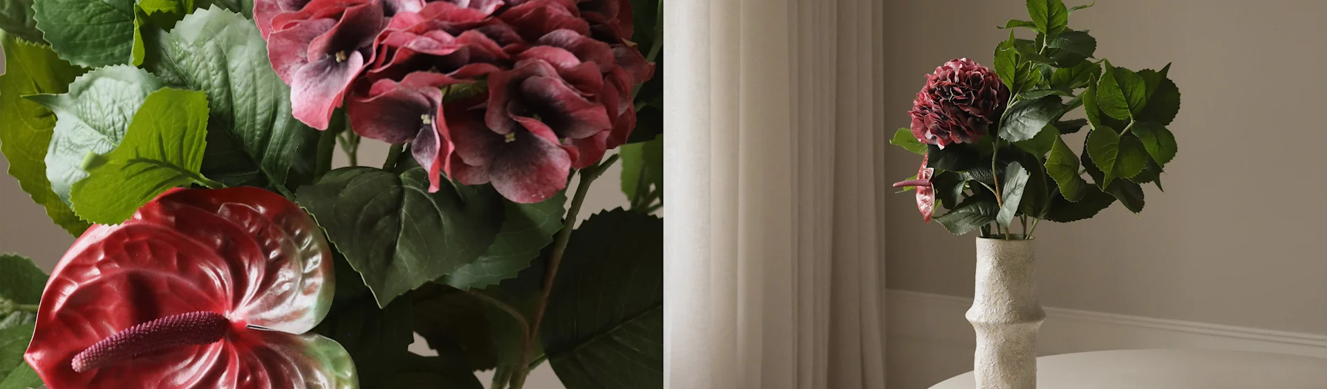Hortensia rouge foncé et fleurs d'anthurium rouges artificielles dans un vase blanc texturé.